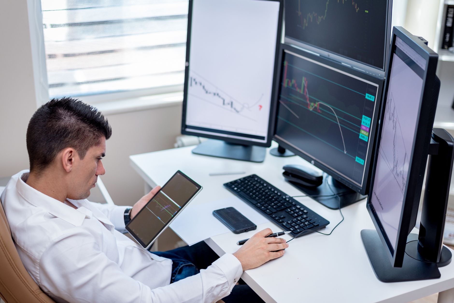 Trader setting up a platform during a prop firm onboarding session